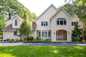 Magnificent Updated Center Hall Colonial With Open Floor Plan