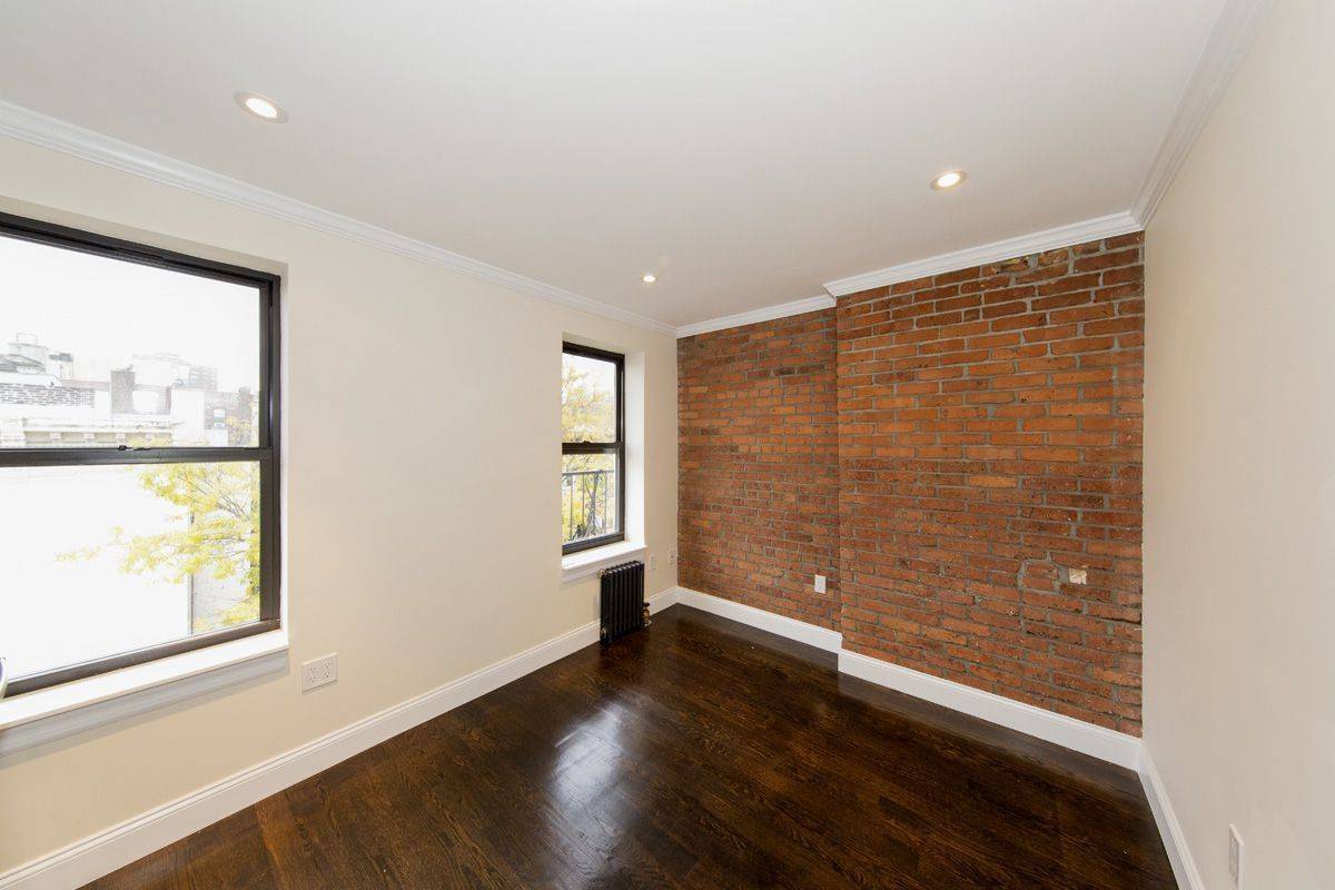 East Village - One Bedroom with Exposed Brick and Modern Finishes