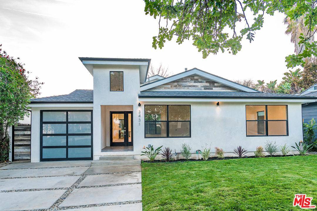 Walk in and be swept away by the beauty of this Westside Village property