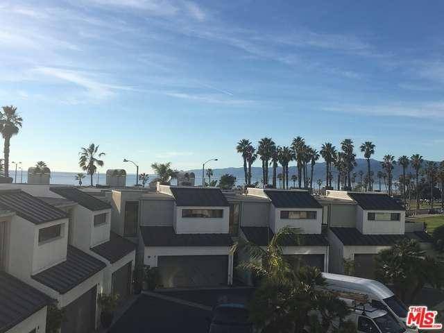 Amazing ocean view townhome just a few feet from the sand