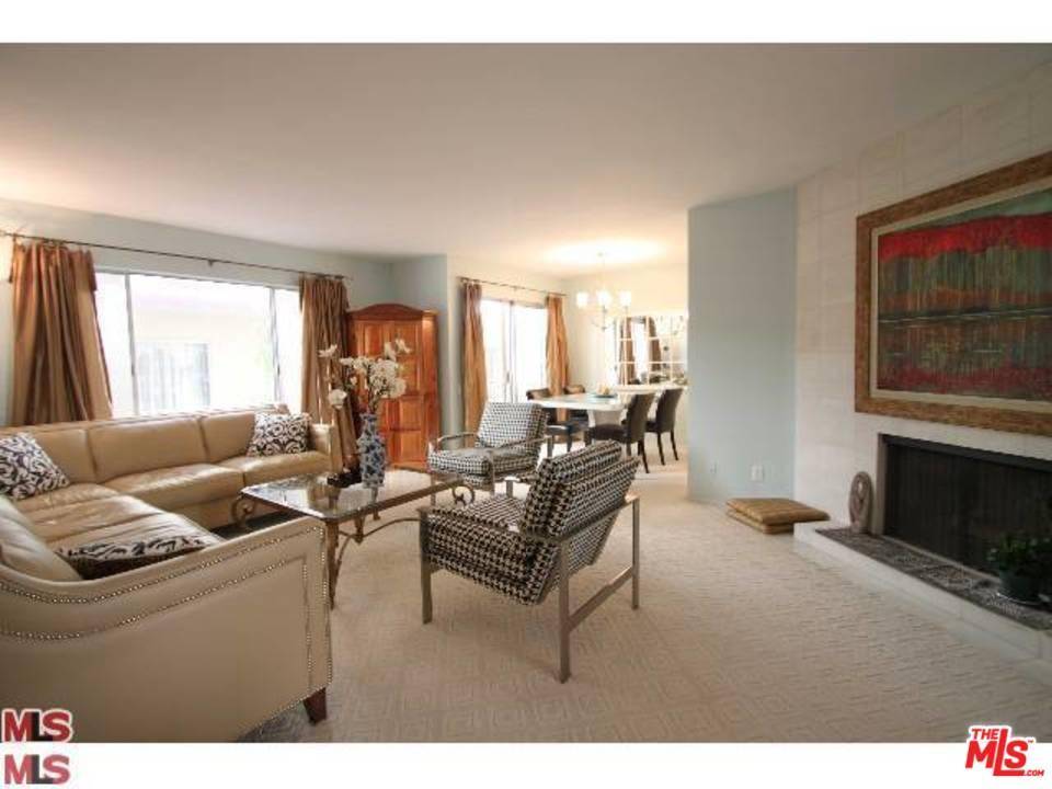 First floor remodeled condominium with a spacious and well-laid out floor plan with white oak flooring throughout