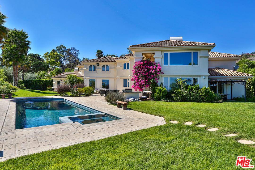 Villa style home in gated Malibu Pacifica Estates with dramatic ocean