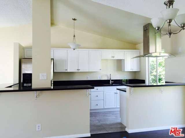 Totally remodeled spacious 3 bedrooms 3 bath apt with hardwood flooring