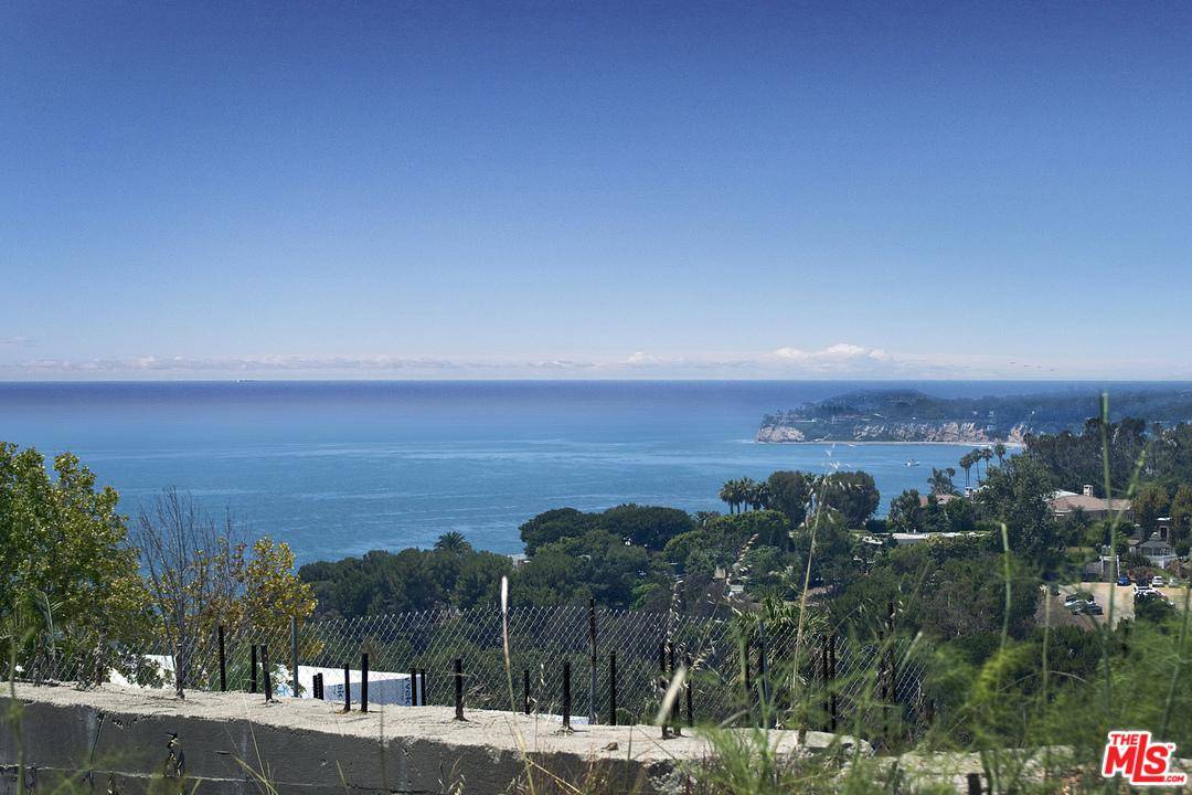 Beautiful ocean and coastline views from this private lot situated off of PCH