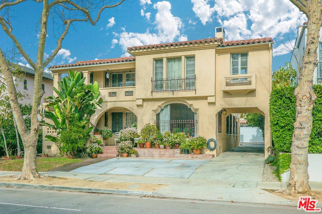 Beautifully remodeled Spanish Style duplex in amazing Beverly Grove location in prestigious Hancock Park school district