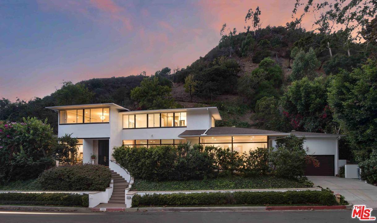 Located in prime Bel Air this is an exceptional example of quintessential mid-century living at its most fine and balanced