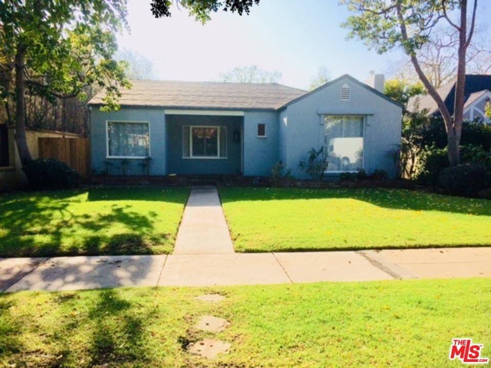 This traditional 3 bedroom - 2 bath home with detached guest house is ideally located 1/2 block from Montana Ave