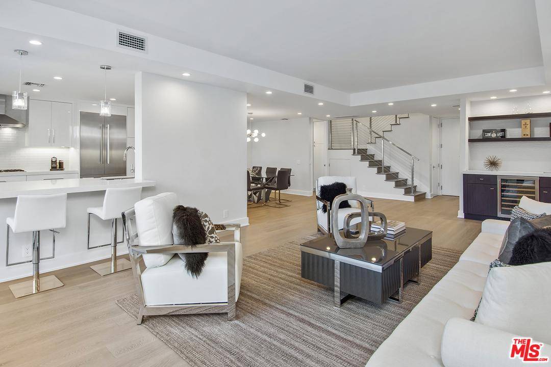 Stunning sophistication in this renovated designer done 2 level townhome in the heart of Beverly Hills