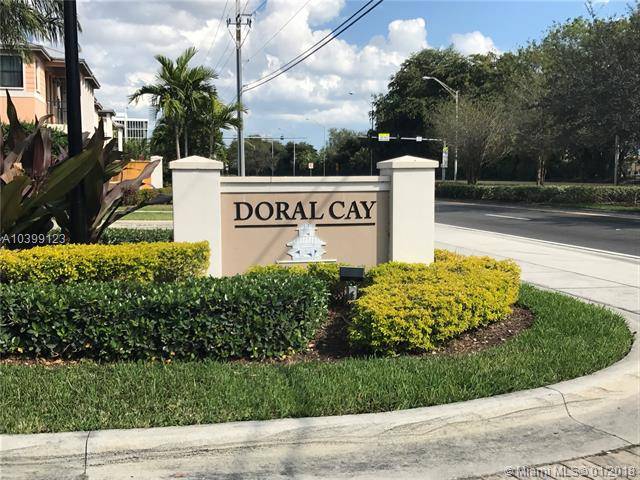 STUNNING CORNER UNIT AND LAKEFRONT TOWNHOME IN PRESTIGIOUS DORAL CAY