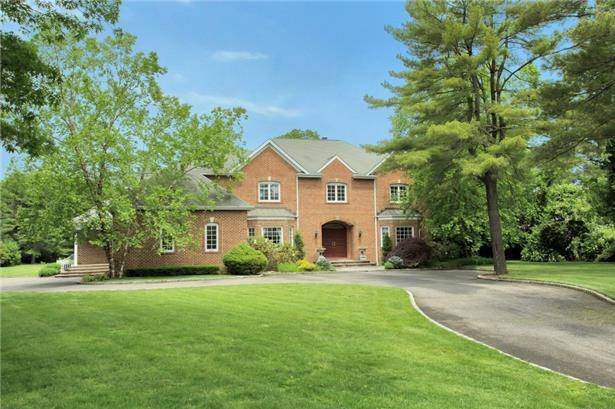 Prime Location In Brookville, NY. Spectacular Brick Center Hall Colonial