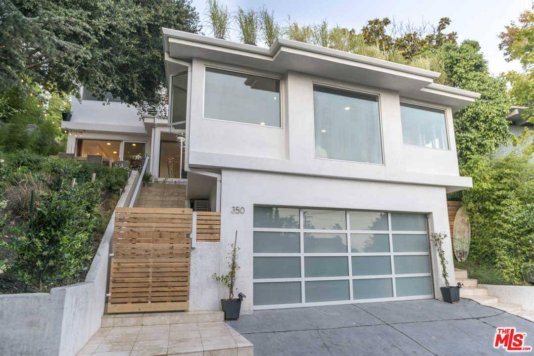 Newly completed ocean and canyon view contemporary in highly sought-after Santa Monica Canyon