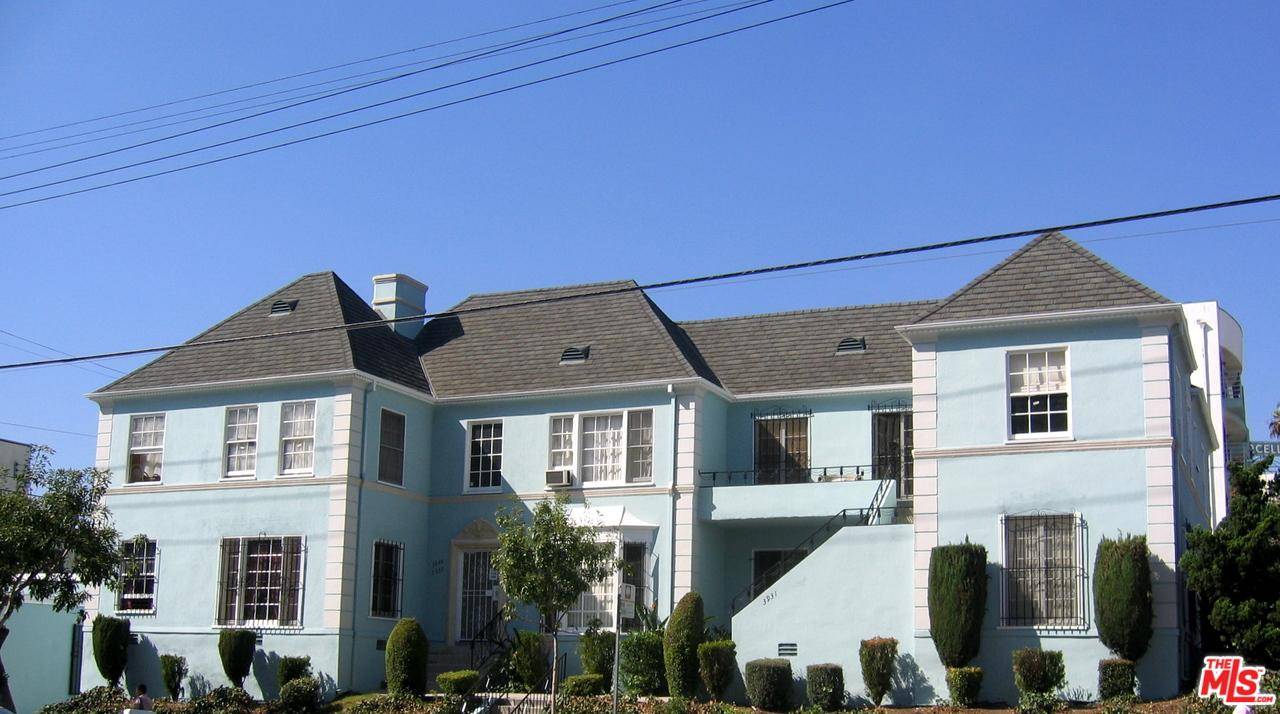 Beautiful French Normandy on a corner lot adjacent to Windsor Square and Koreatown