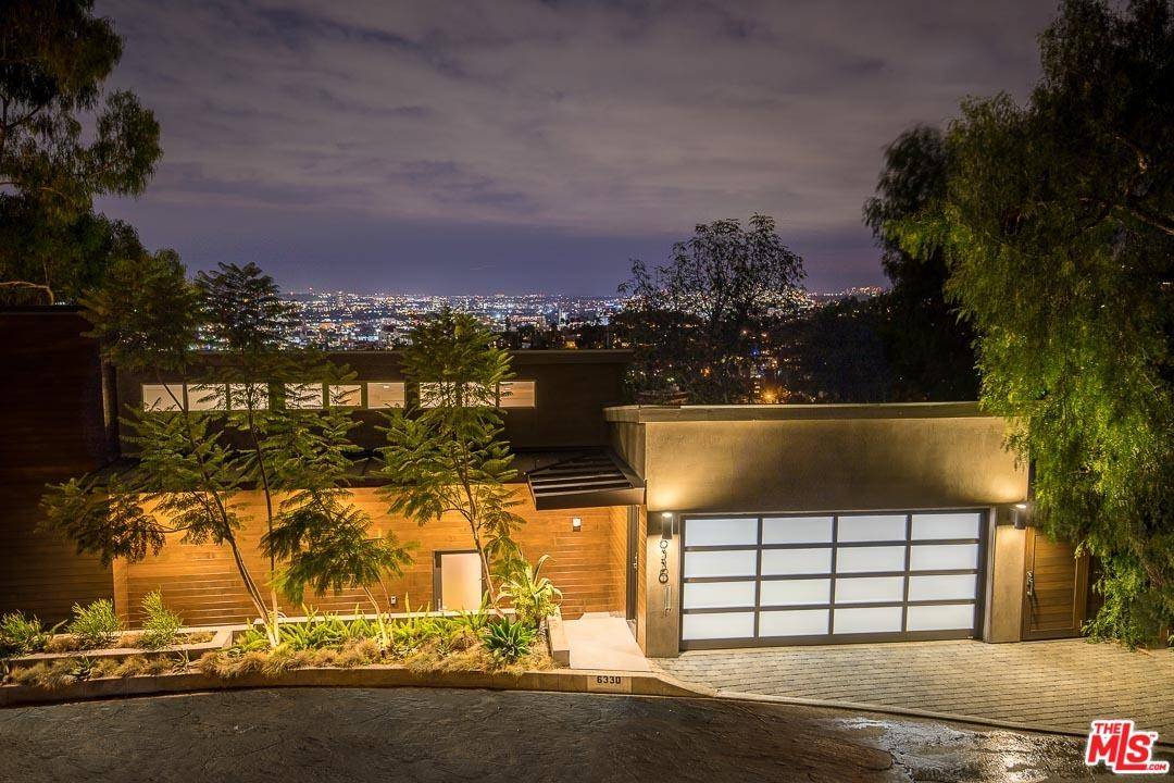 Stunning up-to-date modern home in the coveted Hollywood Dell with panoramic views
