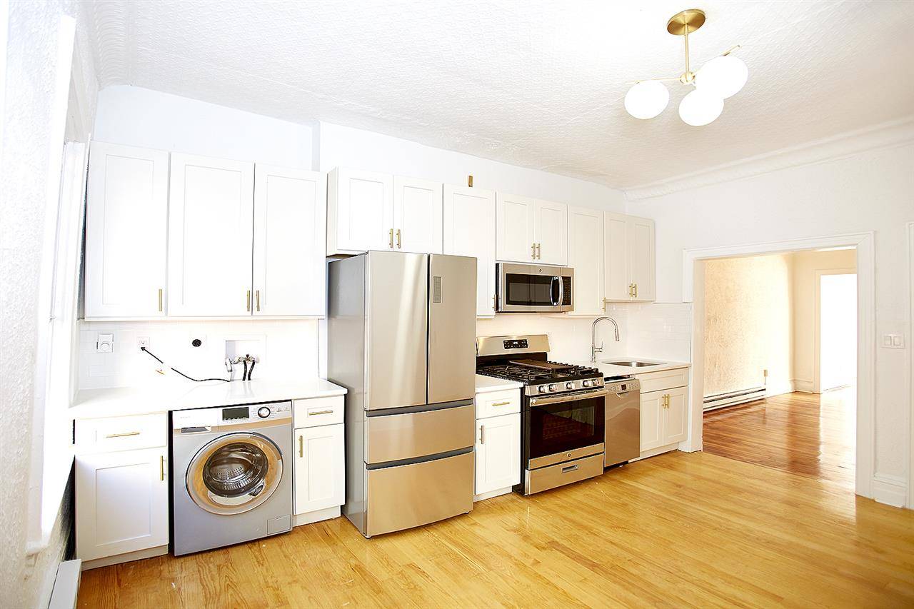 Beautiful and bright 1 BR + home office unit only a few short blocks from the Grove St PATH