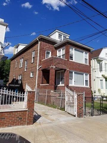 2-family Brick building with GORGEOUS hardwood floors and beautiful inlay