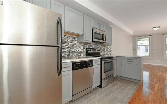 Stylish renovated bright one bedroom home offering sleek & contemporary maple cabinets with soft close drawers; stainless steel appliances