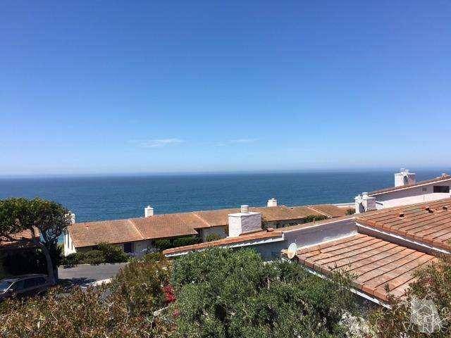 Remodeled 3 bedrooms and 3 bath ocean view gated Zuma Bay Villa with approximately 1