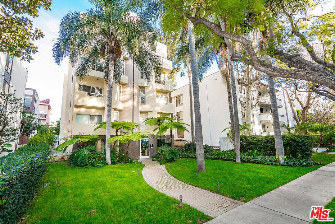 Elegant front facing condo well located on a beautiful tree lined street in desirable Beverly Hills near trendy West Hollywood