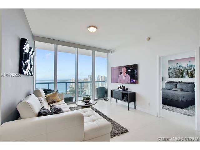 This spectacular sub-penthouse 2 bedroom luxury condo has miles of horizon views in all directions