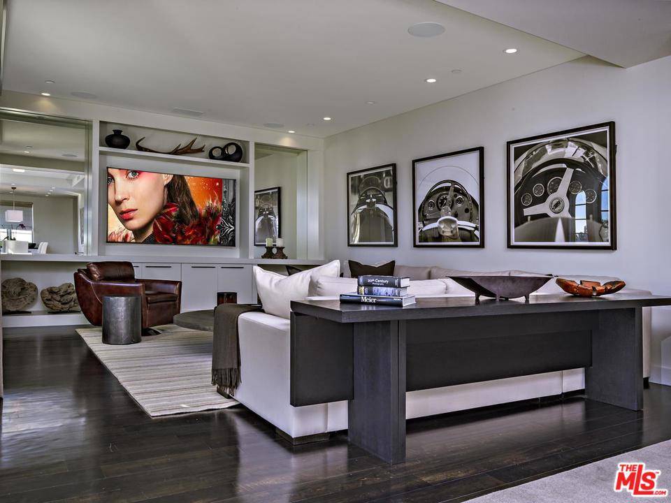 Elegant modern penthouse in the heart of Beverly Hills with a private rooftop deck complete with outdoor kitchen