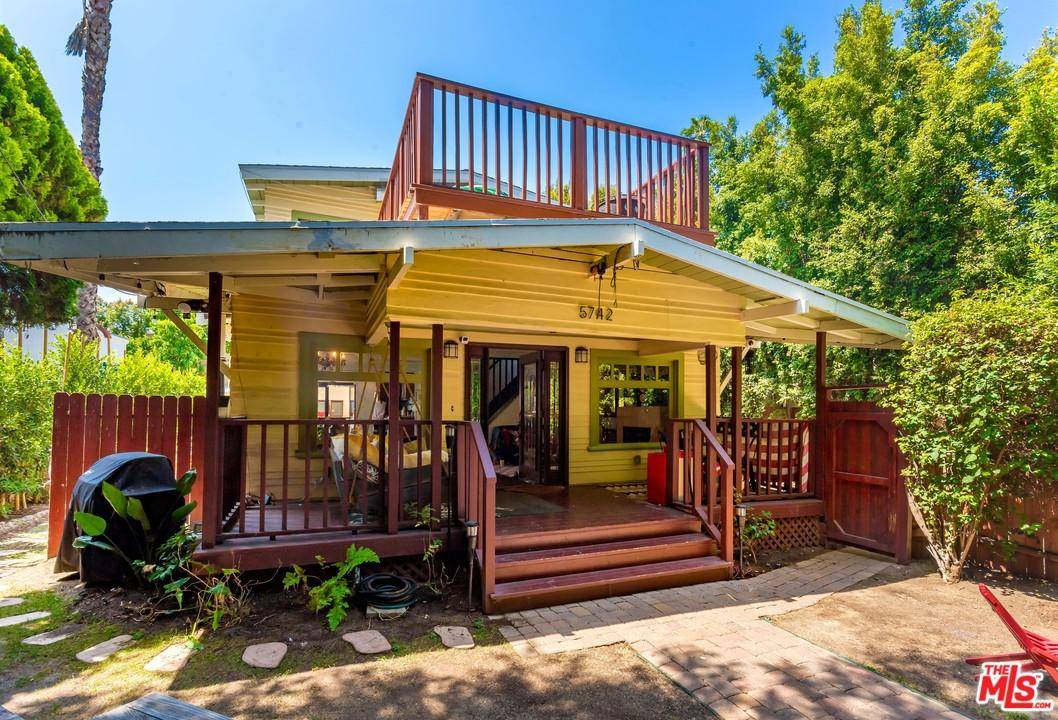 5742 La Mirada Avenue is a charming craftsman style duplex situated on a 7