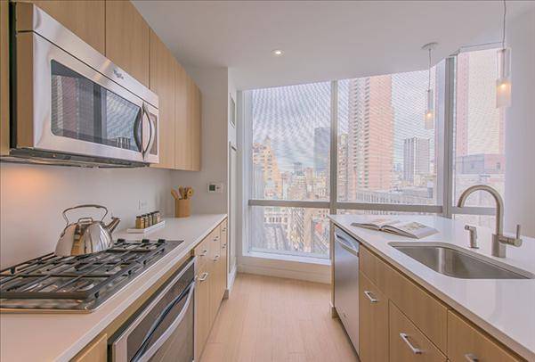 Striking Midtown East 1 Bedroom Apartment with 1 Bath featuring a Fitness Center and Pool