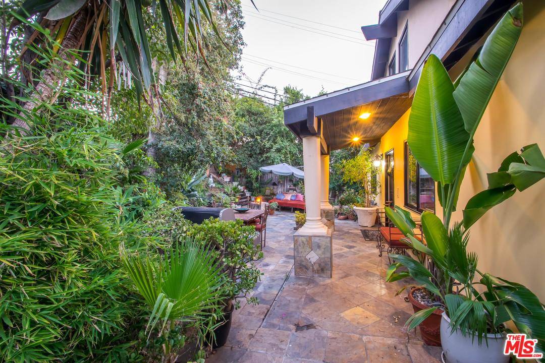 Good value - this quaint lower Beachwood Cyn traditional home with a Spanish flair truly embodies the Hollywood Hills lifestyle