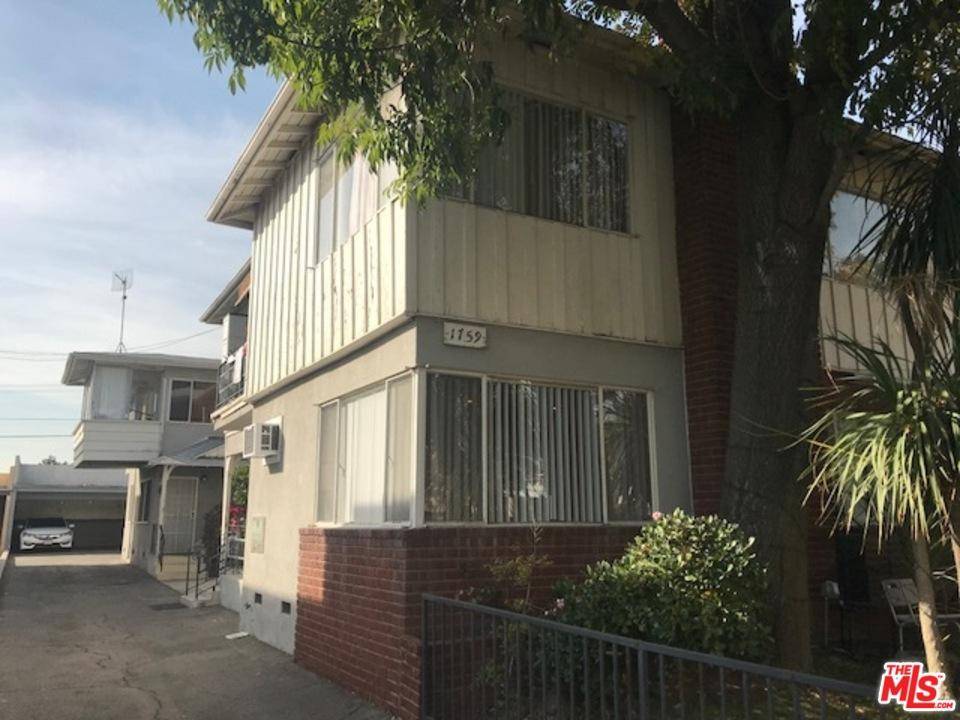 Nice spacious first floor two bedroom one and half bathroom apartment with one assigned carport parking spot located in the heart of Hollywood