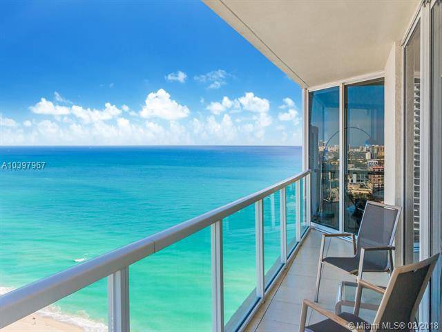 Updated high floor corner residence with views of the ocean