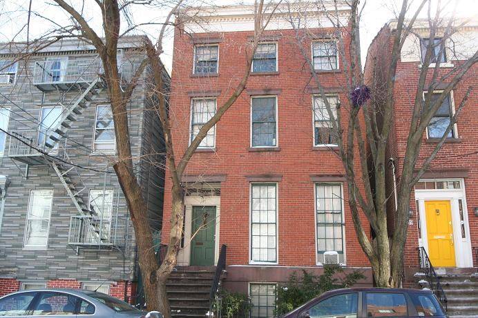 Renovated 2 bedroom on the top floor of a historic brick row house