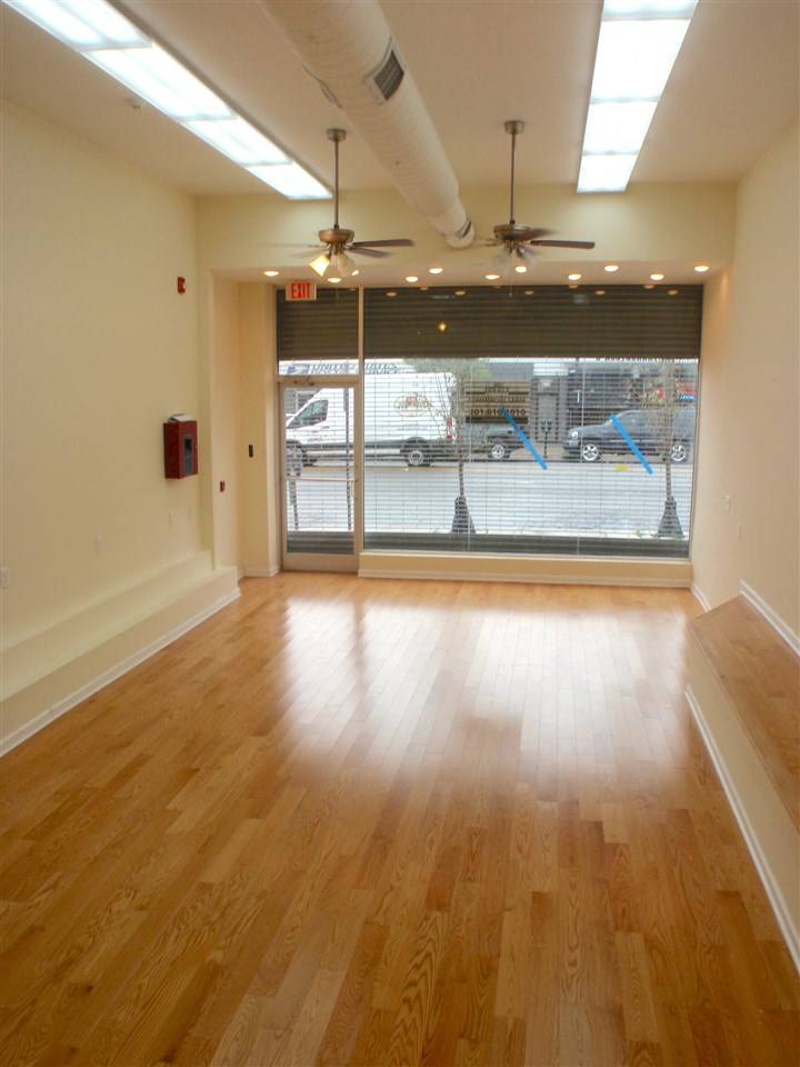 Live and work in this renovated mixed use commercial building located at 606 Kennedy Boulevard in Union City