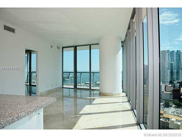 This panoramic corner unit is one of the nicest available with breathtaking city and bay views