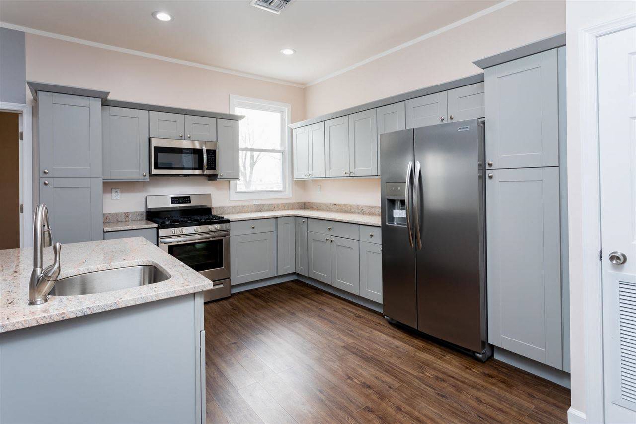 This newly renovated 2 bedroom + den 1 bath has stainless steel appliances