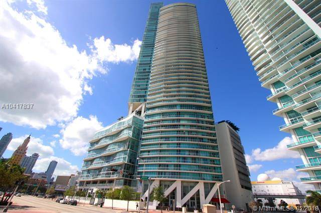 Spectacular 33rd floor 2 BED + DEN & 2 BATH residence featuring 2 PARKING SPACES