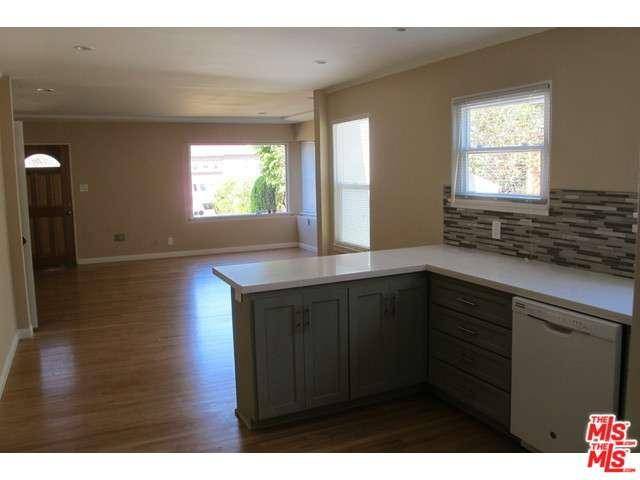 Start 2017 right in this bright and newly remodeled home with an open floor plan