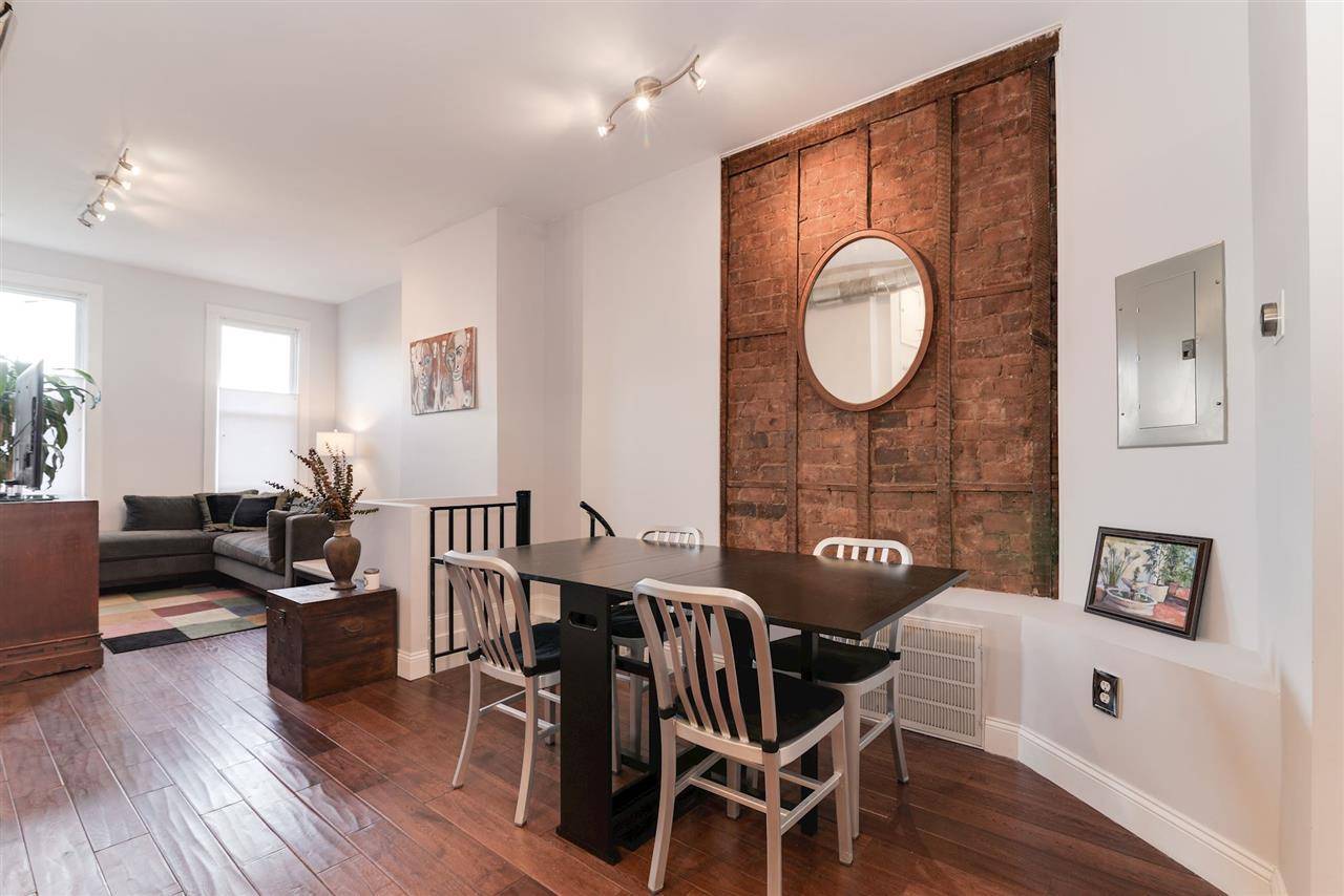 Sun drenched 2BR/2BA + Den duplex condo in the heart of Jersey City's Heights