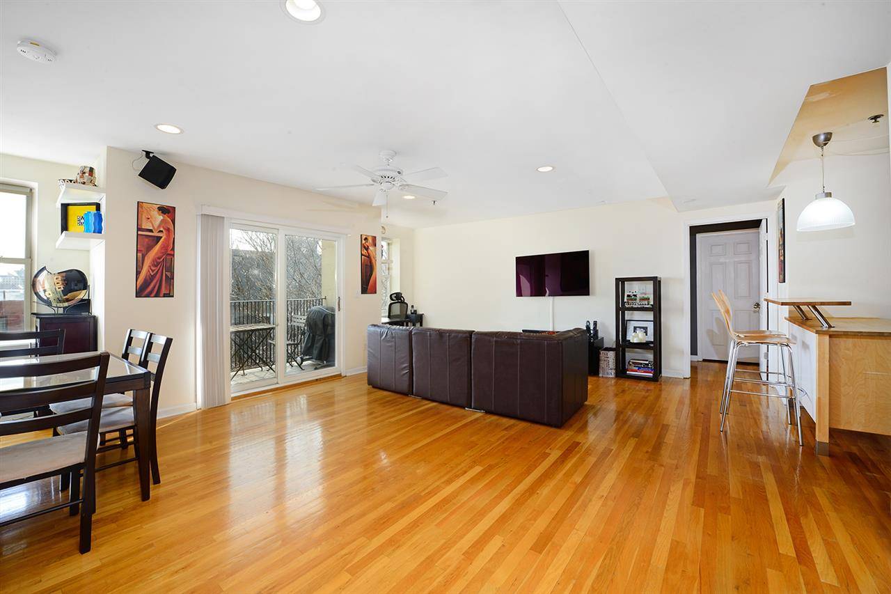 This beautiful top floor Hoboken condo offers a great open layout with unobstructed views of the Empire State Building