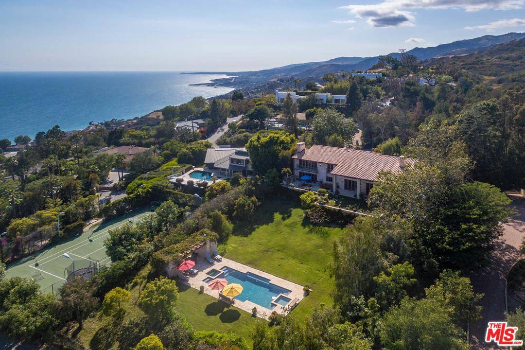 Panoramic ocean views from this stunning private Tuscan Villa estate w/beautifully manicured grounds