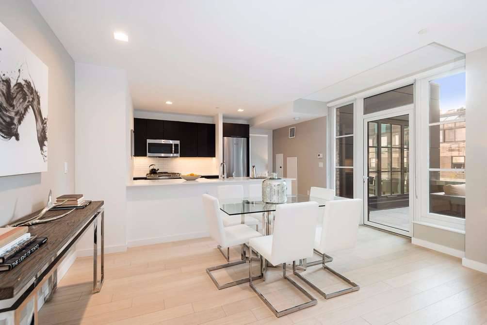 No Broker Fee + 2 Months Free Rent!!!   Limited Time Only!!!   Exceptional Hell's Kitchen 2 Bedroom Apartment with 2 Baths featuring a Rooftop Deck and Fitness Facility