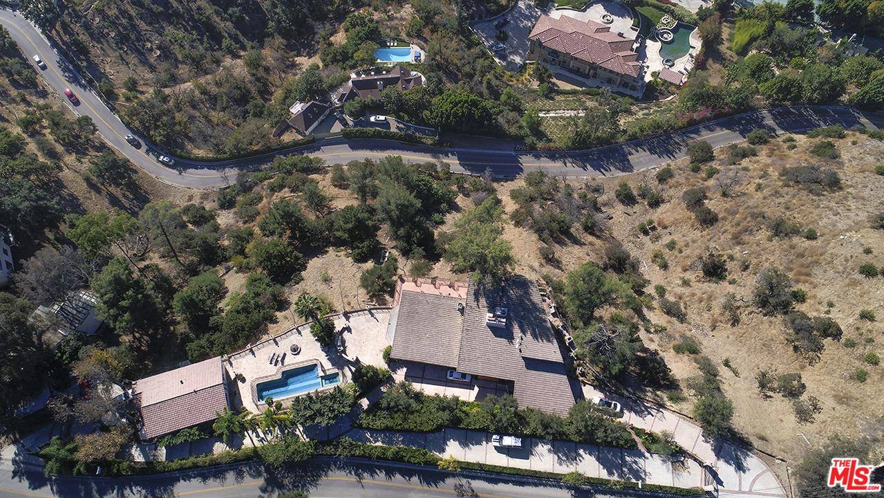 Breathtaking views from atop this Benedict Canyon gem offered at LAND VALUE