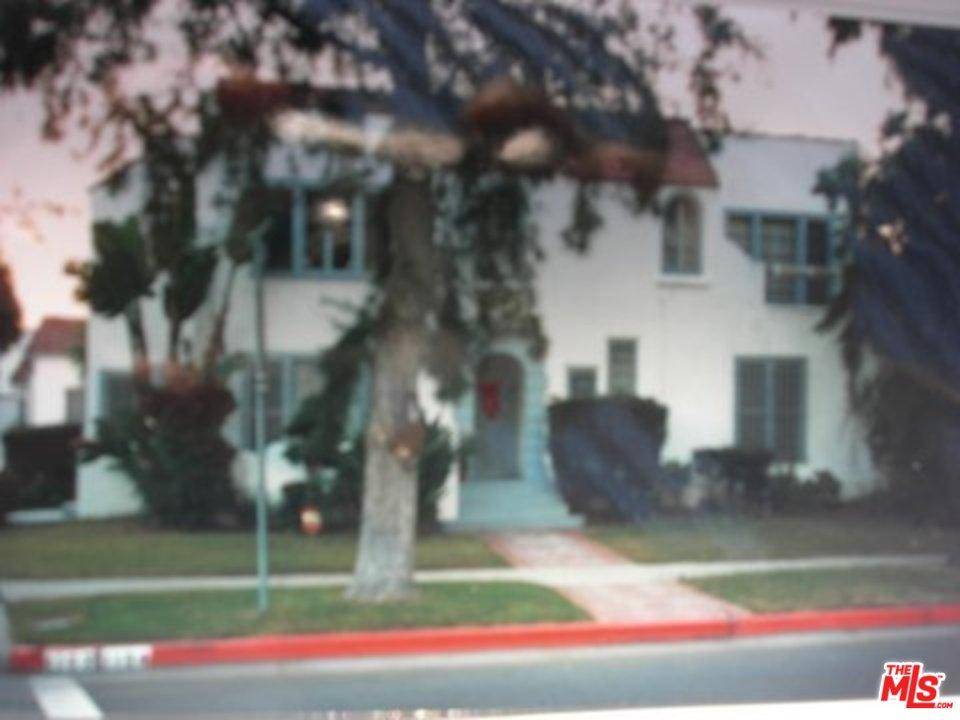 Authentic Spanish Duplex on large corner lot - 9 BR Triplex Los Angeles