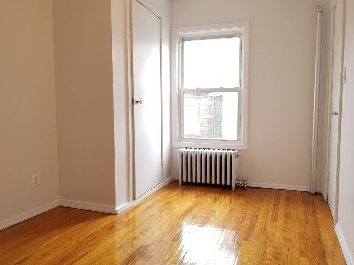 A SURPRISINGLY LARGE FULL FLOOR 1BR/1BATH OASIS ON METROPOLITAN AVENUE WITH COMMON COURTYARD!