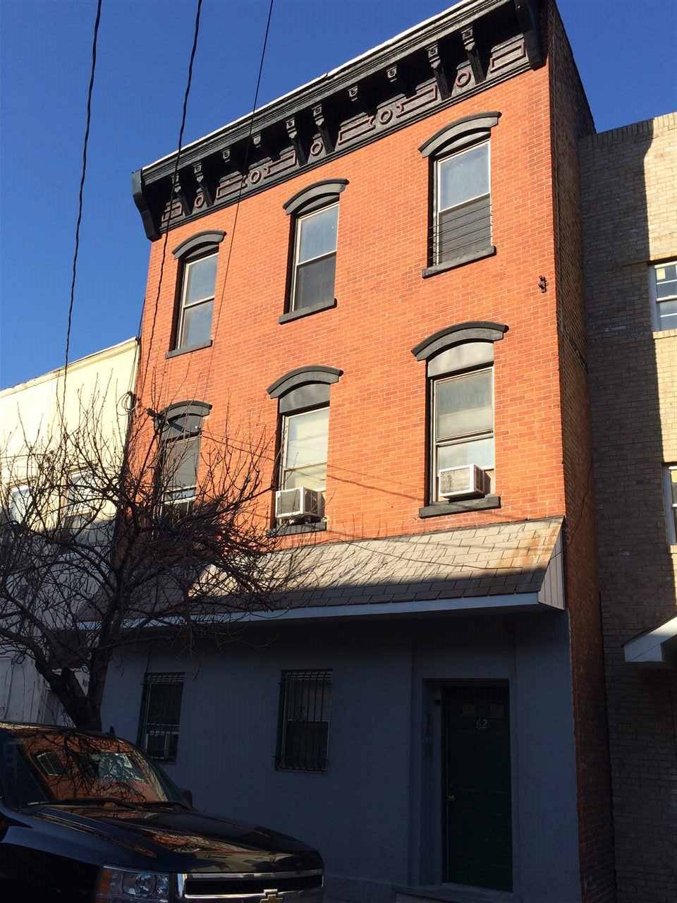 Prime Investment opportunity to own a solid brick three family in Jersey City