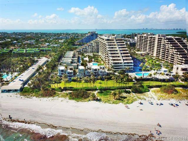 Rarely available direct oceanfront townhouse in Key Colony which is ideally set on the pristine Key Biscayne beach