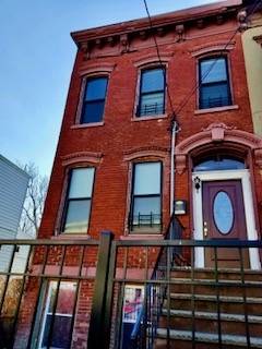 Completely renovated Brick 3 bedroom 2 full bath Duplex apartment with cast Iron soaking tubs