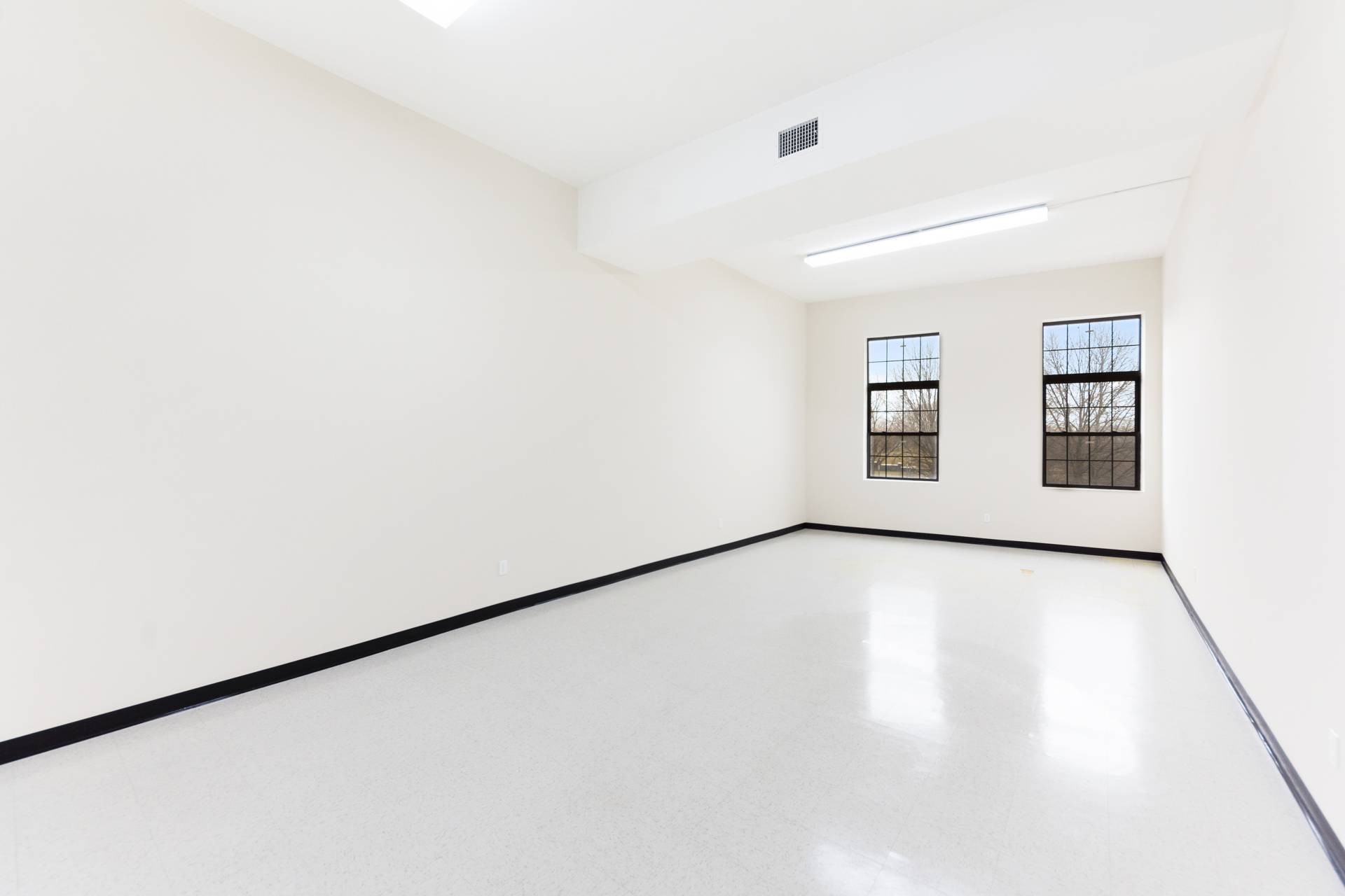 Bronx Commercial Lease: White Box Executive Suite with Tremont Park Views