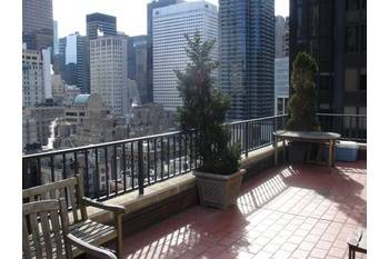 Wrap terrace with city views. Steps from Central Park. Large one bedroom, 1.5 bath with bonus office space/dining room.