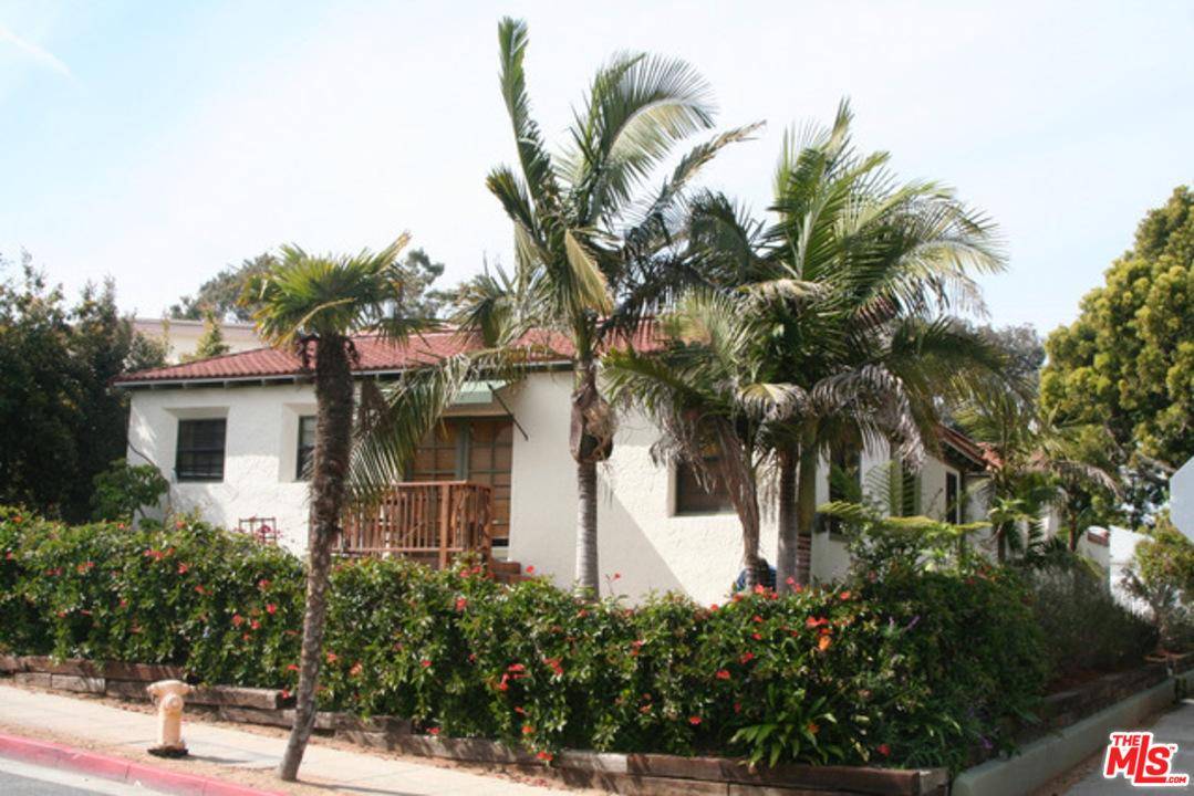 The 1929 Triplex Spanish bungalow cottages are located on a corner lot in Ocean Park in Santa Monica