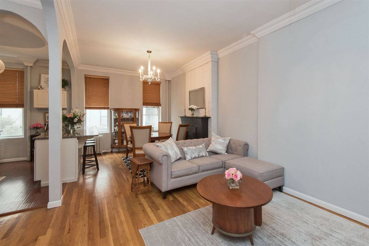 This beautifully updated classic row house is perfect for the 1st time buyer