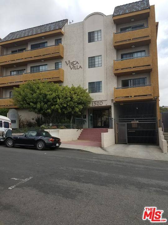2 Bed 2 bath bright corner unit in heart of Hollywood north of Sunset Blvd offers open floor plan